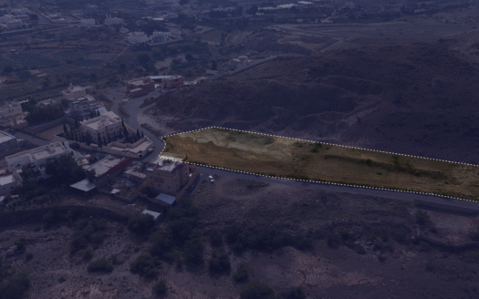 أرض خام 7,350م² في موقع حيوي – فرصة استثمارية لبناء مشروع سكني استثماري متكامل!