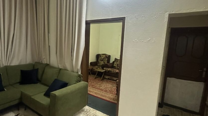 ارض تنومة بها بيت