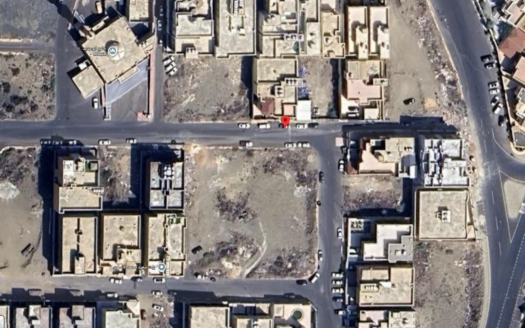 ارض خلف مستشفي الولاده